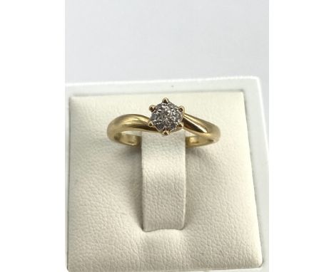 An 18ct yellow gold diamond cluster solitaire ring, size L, weight is 2.4 grams approx