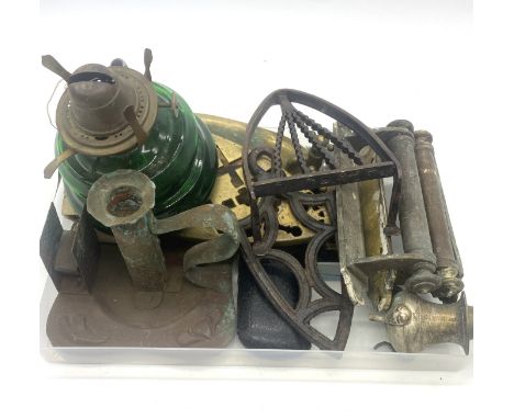 A box lot of items, tilly lamp, brass handles, cast iron fireside stands
