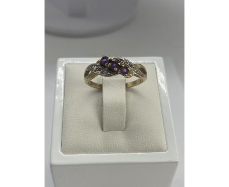 A 9ct yellow gold amethyst &amp; diamond dress ring, 2 grams approx