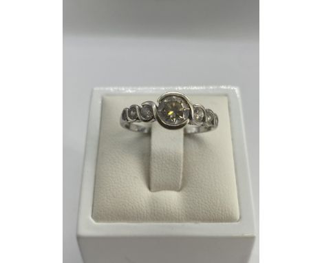 A 9ct white gold cz stone dress ring, size R, weight is 2.6 grams approx