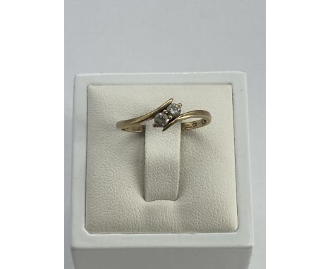 A 9ct yellow gold cz dress ring, size O, weight is 1.3 grams