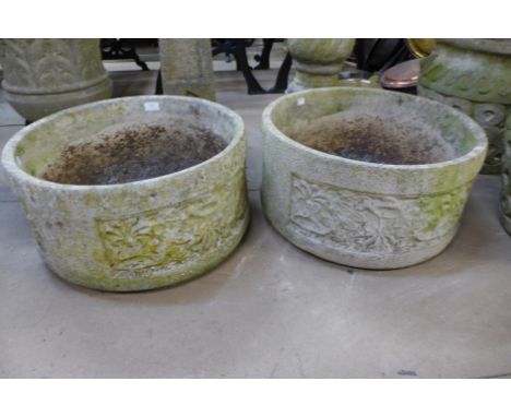 Two concrete garden planters