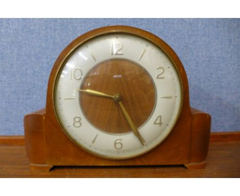 An Art Deco Smiths walnut mantel clock