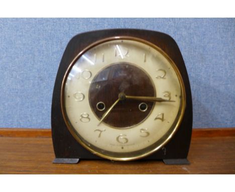 An Art Deco Smiths walnut mantel clock