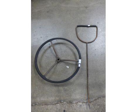A tractor steering wheel and one other