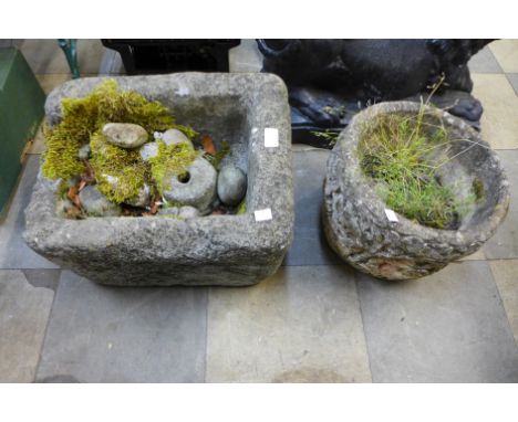 Two concrete garden planters