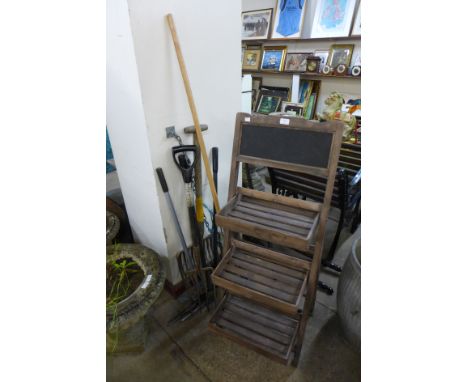 Assorted garden tools and a planter