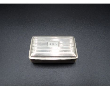 A George III silver Snuff Box of reeded form, engraved initials JHA, Birmingham 1813, maker: John Shaw 