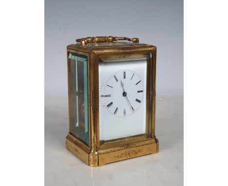 A 19th Century French engraved brass cased Carriage Clock, with white enamel dial marked with Roman Numerals marked "Jules A 