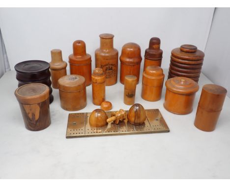 A Collection of treen Bottle Holders, Jars, etc, and a brass Cribbage Board 