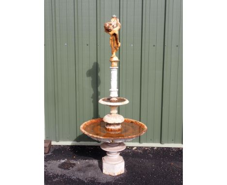 A white painted cast iron circular Fountain with leafage detail and having cherub finial, (A/F), 6ft 6in H overall 