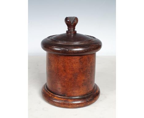 A late 18th Century/early 19th Century Lignum Vitae String Barrel, the threaded cover with cutter finial, 7in H 