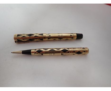 A Waterman's filigree Lady Patricia Fountain Pen and Propelling Pencil, engraved initials H.P 
