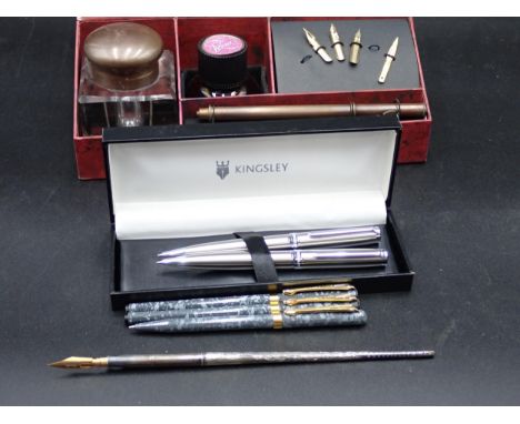 A silver handled Knib Pen, Kingsley Ballpoint, a Propelling Pencil, Crystal Inkwell Set, and a Pen Quest Trio 