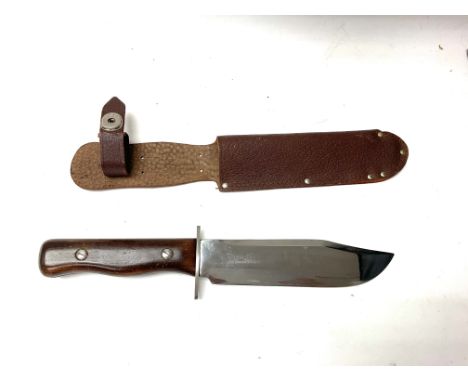 Wilkinson Bowie knife and sheath (Blade approx 18cm). Shipping category C.