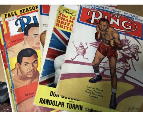 Two boxes containing boxing magazines including World boxing review and The Ring