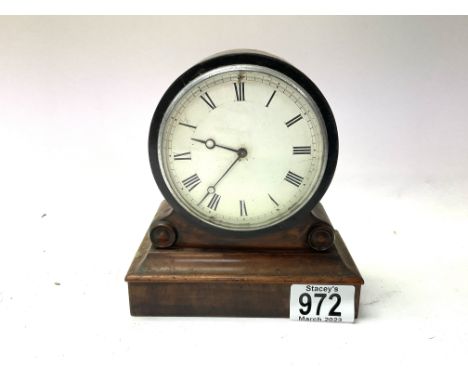 A small French mahogany veneered barrell style mantle clock. 16cm, Cat D.