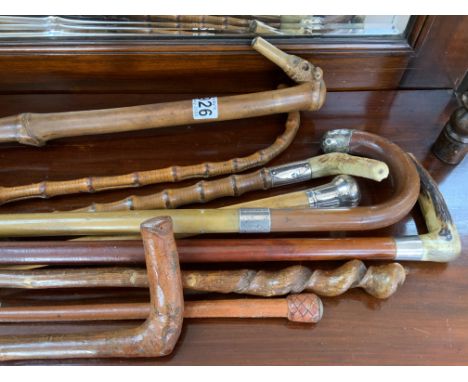 9 various vintage walking sticks and riding crops. NO RESERVE