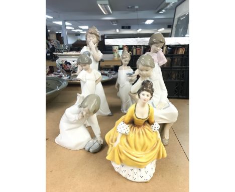 A small collection of Lladro, Nao (with needs of restoration) and a royal Doulton figure. NO RESERVE