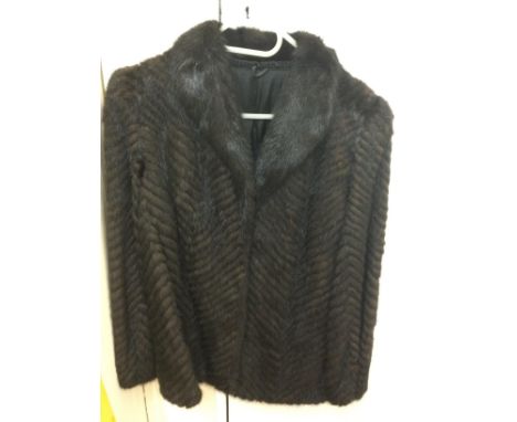 A vintage mink jacket. Shipping category C.