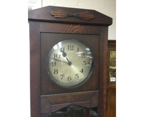 A circa 1920s oak longcase clock with Art Deco influence, approx height 192cm. Shipping category D.