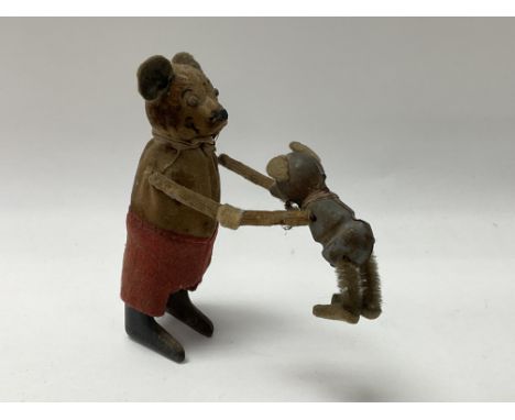 A vintage Schuco tin plate clockwork Mickey, 10.5cm. NO RESERVE