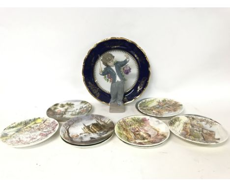 A Lladro figure of a conductor boy, Carlsbad Cobalt plates &amp; Poole collectors plates