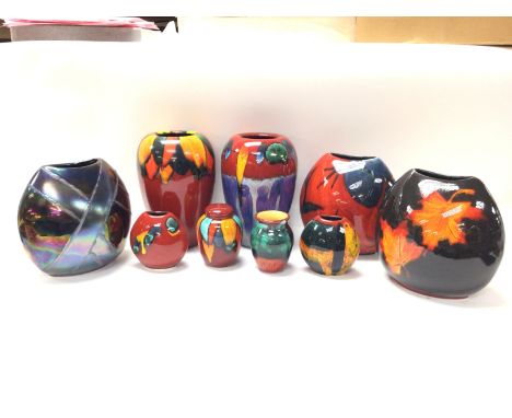 A collection of modern Poole vases ranging from 10 to 21cm tall
