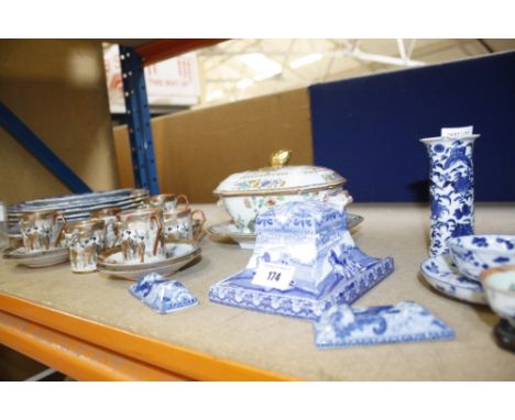 A selection of mostly blue and white printed pottery to include a pair of knife rests, a Japanese part tea service etc
