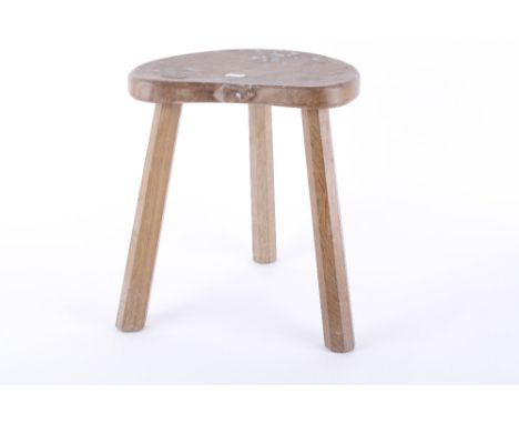 A Mouseman oak three legged stool