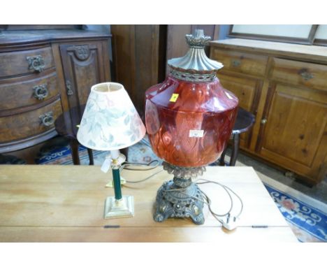 Electric lamp with red glass shade, styled as an oil lantern, 60 cm high, and green column lamp