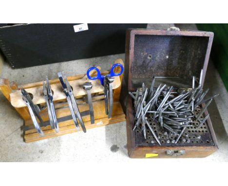 Boxed set of watch tools and rack of fine pliers 