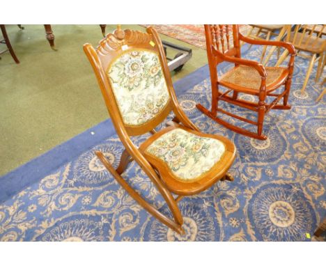 Folding tapestry upholstered rocking chair 