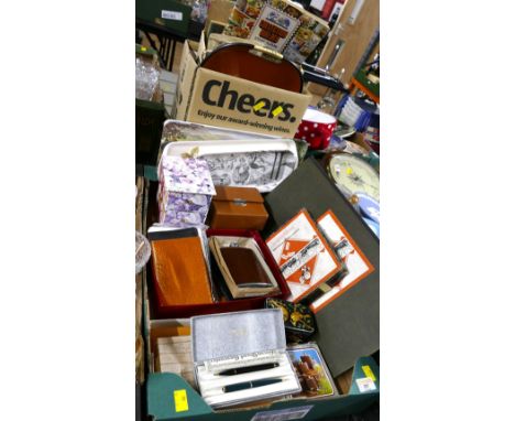 Two boxes of Monopoly board game, leather purses and wallets, gents grooming set, plastic trays, stamp albums etc