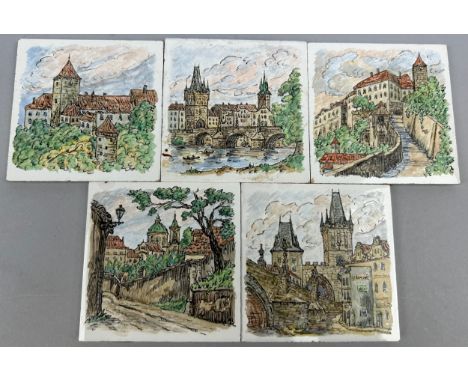 A SET OF FIVE CZECH REPUBLIC CERAMIC TILES DEPICTING ARCHITECTURAL DESIGNS, hand painted scenes of houses in Czech Republic. 