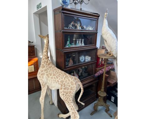 A LARGE FIVE TIER GLOBE WERNICKE SECTIONAL BOOKCASE, glass fronted teak, brass bound with makers plaque to each section.192cm