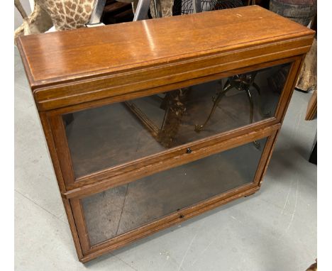 A GLOBE WERNICKE TWO TIER SECTIONAL BOOKCASE, labelled within85cm x 80cm 