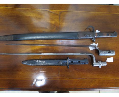 A 1907 pattern bayonet altered with Quillow, a French or possibly Dutch spike bayonet, a Belgian Albini Braendlin bayonet and