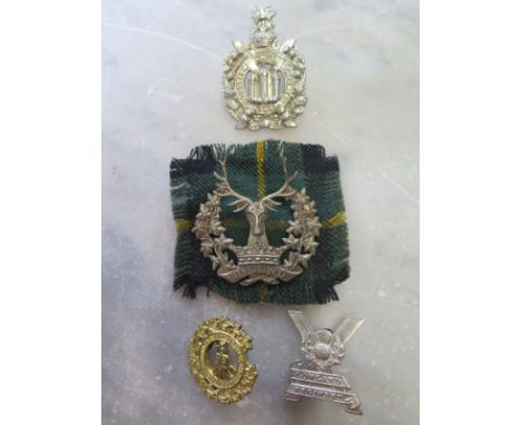 Four Scottish Regimental cap badges to include Argyle Light Infantry, Lowland Regiment, Kings Scottish Own Boarders, Gordon H