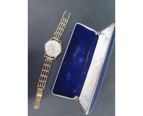A 9ct yellow gold gents manual wind Rotary Maximus wristwatch with a 9ct gold strap, presentation engraving to back - working