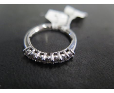 An 18ct white gold seven stone diamond ring - total approx diamond weight 0.50ct - ring size M - approx weight 3.9 grams - ex