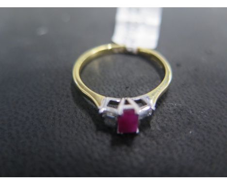 An 18ct white gold ruby and diamond ring - approx weight 2.2 grams - ring size O - ex jewellers stock, in new unused conditio