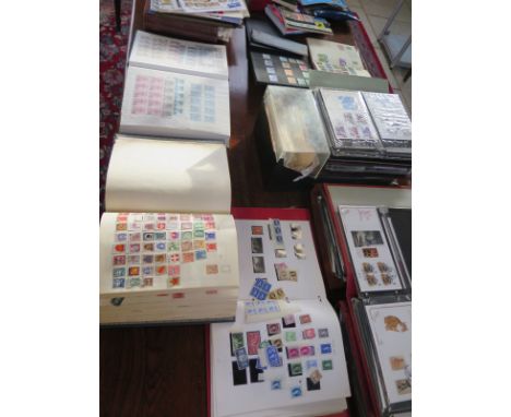 A good collection of stamps to include First Day Covers, sheets of mint gutter loose stamps, 13 albums in total 