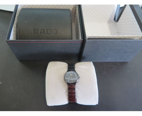 A ladies Rado wristwatch with high tech ceramic bracelet strap - in working condition, running in the saleroom, with box and 