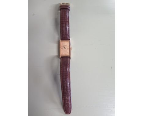 A 9ct yellow gold gents manual wind Longines wristwatch circa 1940's - 4cm x 2cm including winder - some staining to dial, mi