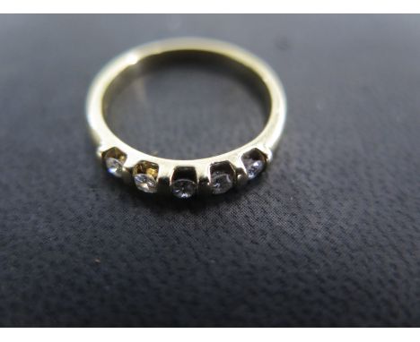 An 18ct yellow gold five stone diamond ring size N - approx weight 3.1 grams - total diamond weight approx 0.3ct - light surf