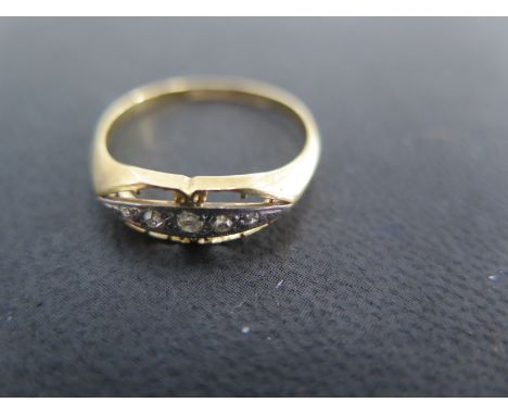 An 18ct yellow gold and diamond five stone ring size Q - approx weight 2.3 grams - surface scratches, light usage wear 