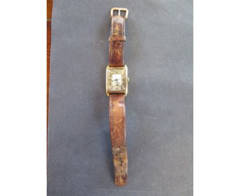 A vintage Rolex 18ct yellow gold gents dress watch with a 15 jewel manual wind movement - Width 26mm including winder x 36mm 