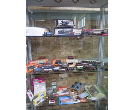 A collection of OO gauge railway including three boxed Bachmann locos and assorted rolling stock and buildings and two other 