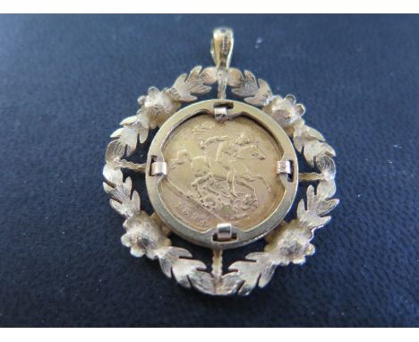 A Victorian half Sovereign dated 1894 in a 9ct yellow gold mount with suspension loop - total weight approx 9.1 grams - coin 